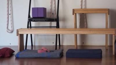 Yoga-props-blocks-chair-blankets-foam-pad-sandbags-benches-and-ropes